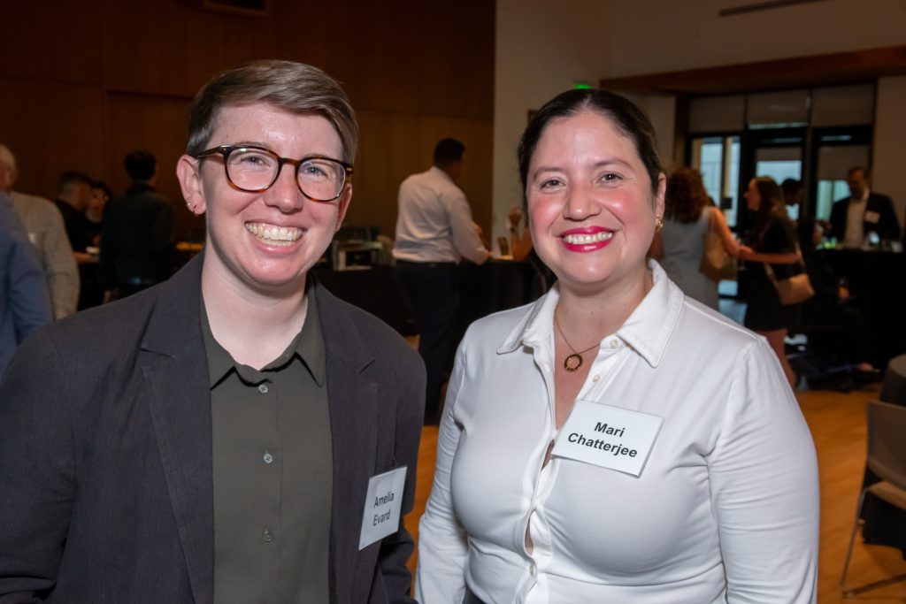 DRA's Amelia Evard smiling with an event guest