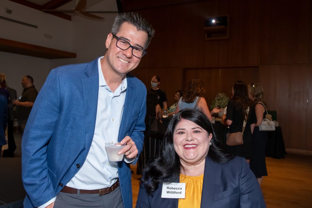 DRA's Rebecca Williford smiling with an event guest