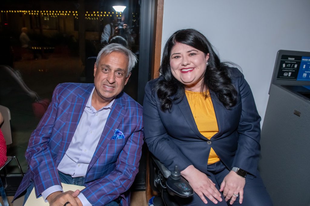 DRA's Rebecca Williford and Honoree Neel Chatterjee smiling together