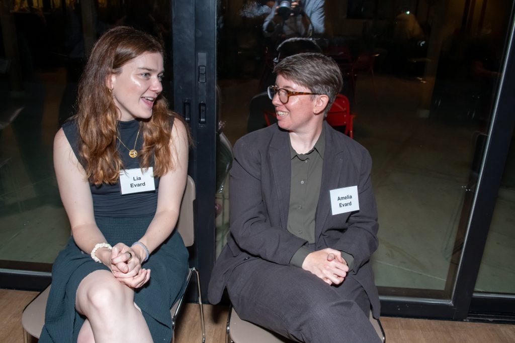 DRA's Amelia Evard speaking with an event guest