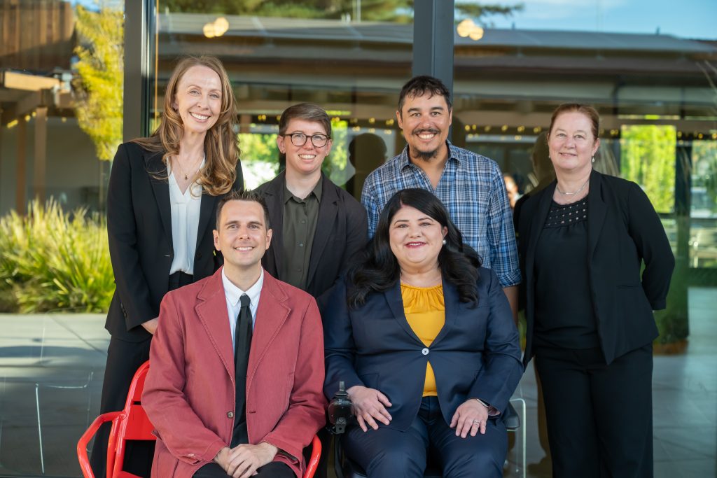 DRA's Kate Hamilton, Amelia Evard, Chris Maccarone, Shawna Parks, Joshua Peterson, and Rebecca Williford posing and smiling together